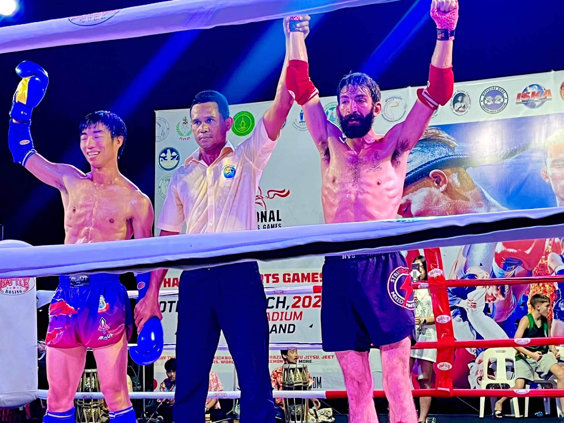 WMO Team USA fighter having his hand raised by the referee after winning at the WMO World Championship in Bangkok, Thailand