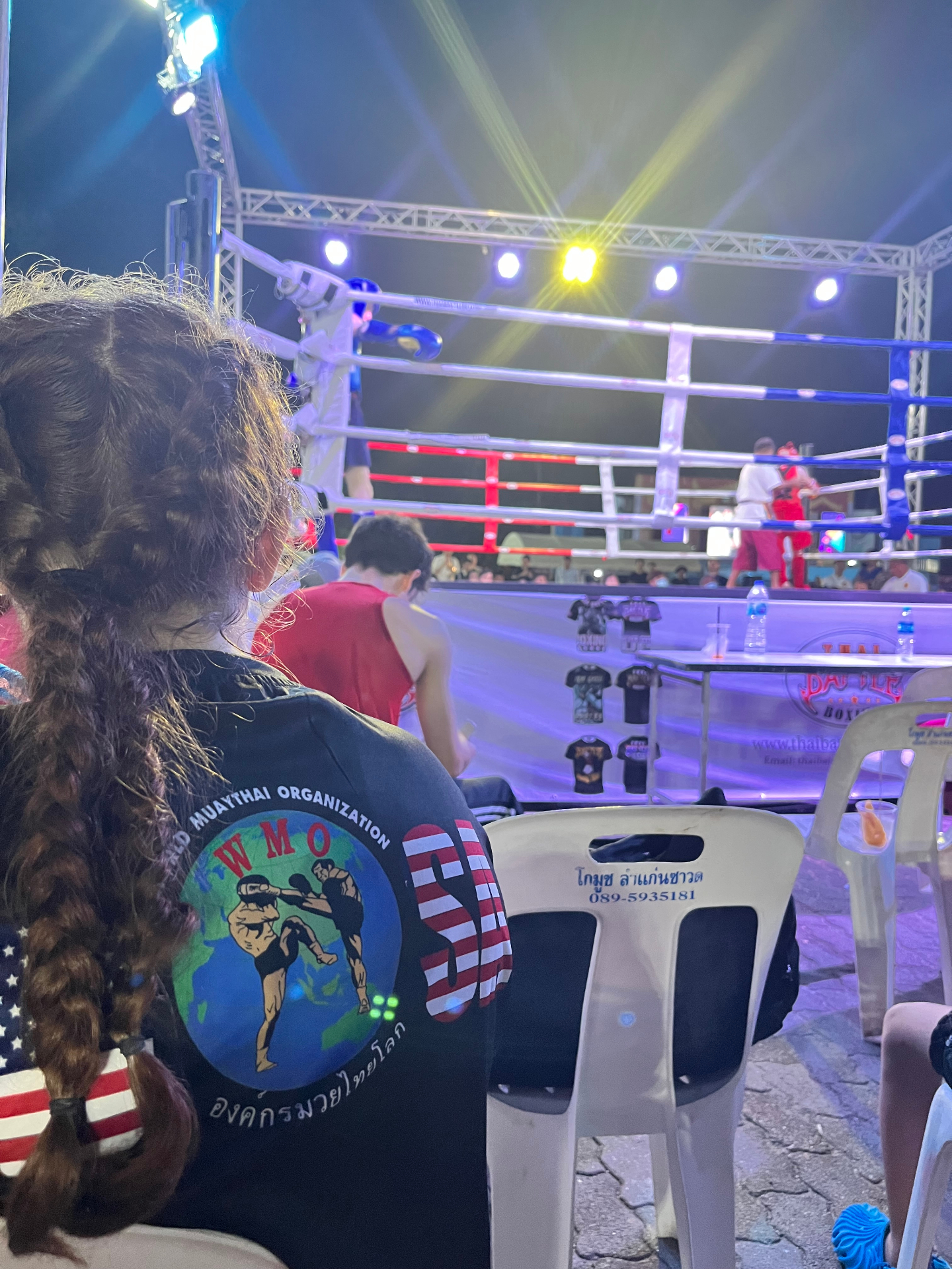 WMO USA supporter watching fights ringside in Thailand