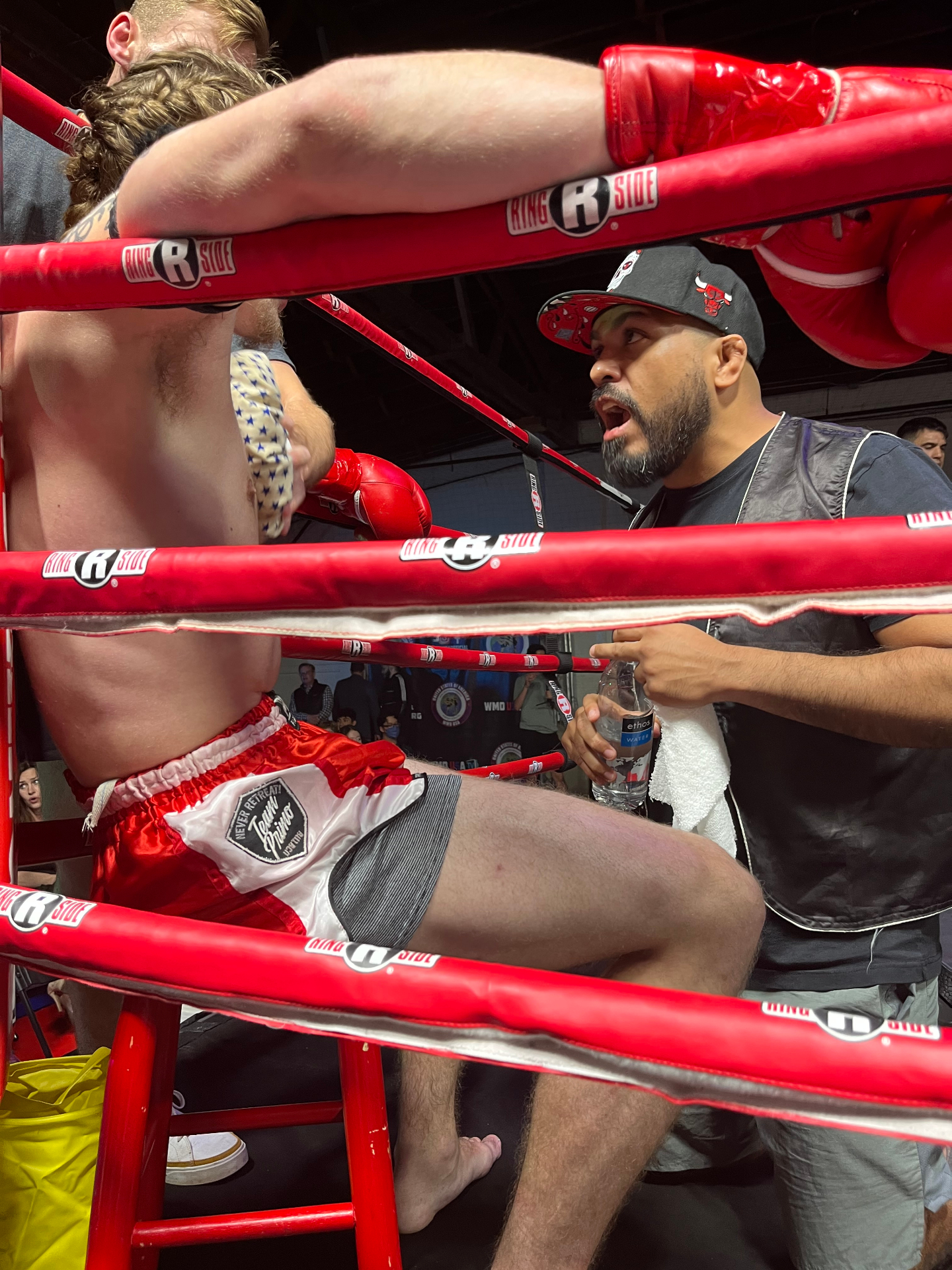 Coach giving corner instructions between rounds