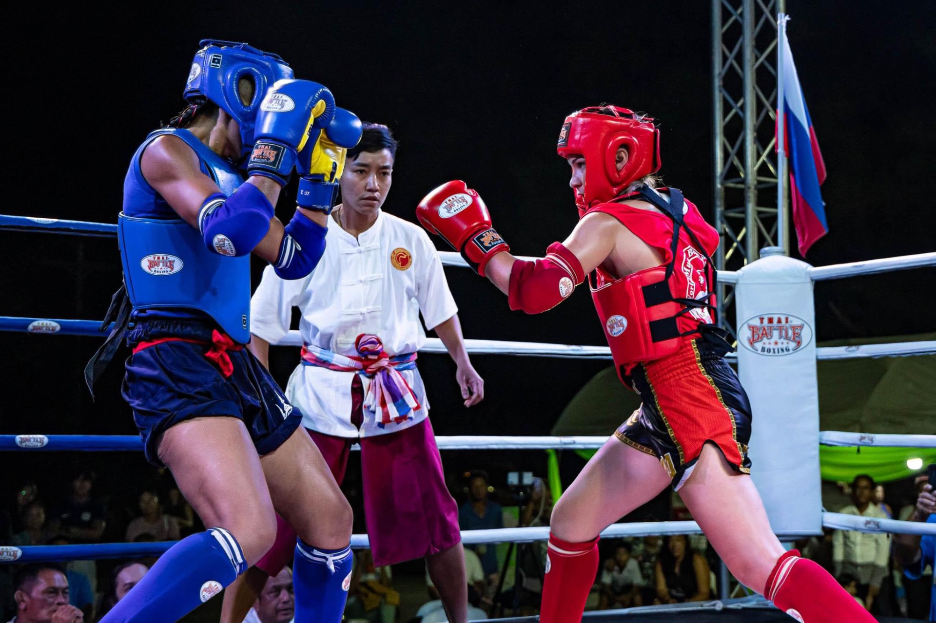 Women's international Muaythai bout inside a WMO sanctioned ring