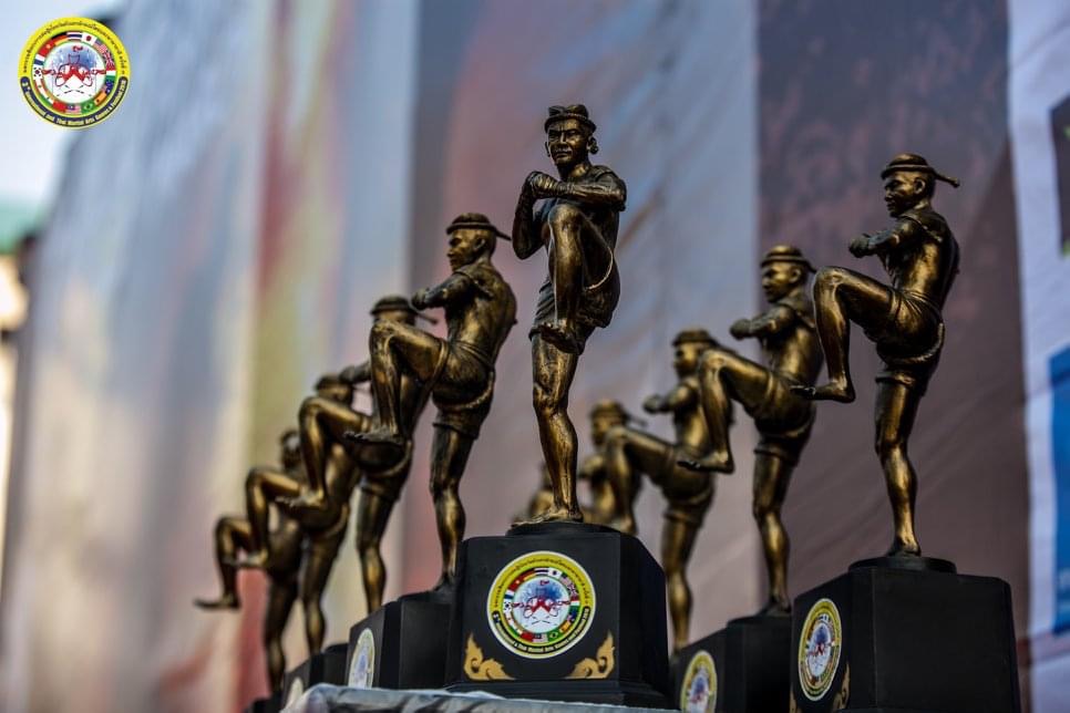 Nai Khanom Tom WMO bronze trophies lined up on the championship podium